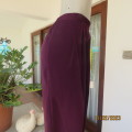 Smart but comfy dark purple satin look polyester pants. Pleated front/elasticated back.Size 40 to 42