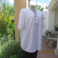 Ultra chic and versatile white V neck button down top with 2 extra loose fronts. Size 42 by DONNA C.