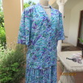 Make a statement in this 2pc skirt/top outfit. Array of blue/green/purple. Size 46. By ALVECO.As new