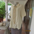 Amazing rich cream CAVIAR top with tasteful embroidery .Smart in stunning fabric. Size 42/18 .As new
