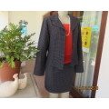 Fabulous 2 pc skirt suit in navy/white fine check poly/viscose fabric. Size 35/11 by SMILEY. As new