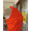 Outrageous orange sexy dress in heavy polyester lace/stretch poly lining. Size 30 by WOOLWORTHS.New