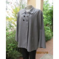 Must have wide cut long sleeve monochrome double breast jacket by DONNA CLAIRE. Size 48.As new.