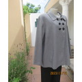 Must have wide cut long sleeve monochrome double breast jacket by DONNA CLAIRE. Size 48.As new.