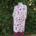 Notice me white sheer polyester short sleeve top with purple dots. Size 42/18.Button down. As new.
