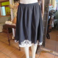 Fabulous black 100% cotton skirt/white embroidered hem elasticated waist size 38 `ATMOSPHERE`.