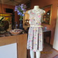 Beautiful plain ecru with colourful posies stretch viscose/poly dress.Build in bra. Size 34. New con