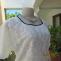 Ultimate weekend comfort. Soft white acrylic lace slip over short sleeve top. Size 36. New condition