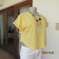 Cute buttercup yellow cropped top with capped sleeves size 36/12 by FACTORIE. Cotton stretch.As new