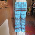 Striking comfy polyester stretch size 36 pants. Turquoise with brown baroque print. Bell bottoms.