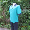 Beautiful jade silky polyester short sleeve top with navy open collar. By WOOLWORTHS size 38. As new