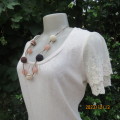 Well know Japanese brand NERVEUX FEMME beige soft stretch knitted top. Size 36. Lace sleeves. As new