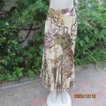 Top of the line QUEENSPARK ankle length trumpet lined skirt. Geometric print in green/brown.Size 37