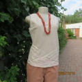 Sweet ecru colour V neck slip over linen/cotton blend top. Lace/ribbon front decoration. Size 34.