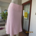 Stunning pale pink stretch poly/viscose skirt by OASIS size 34/10. Unique side panels, Brand new con