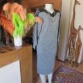 Go for effortless style. Wool/acrylic/cotton blend low calf  knitted dress. By FUJIKI size 34.As new