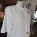 Ultra smart rich cream IBERIS size 38/14 long top double front. Poly/viscose.High neck.Brand new con
