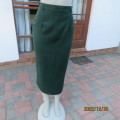 Elegant fully lined ankle lenght bottle green pencil skirt. Viscose/poly blend. TOPICS 34. As new