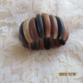 Stunning wooden stretch bracelet made up of different woods. Width 5cm. New condition.