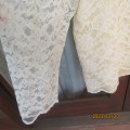 Boutique made rich cream cropped long sleeve top in satin with lace over lay. Size 46/22.Never used.