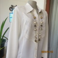 Stylish smart light cream long sleeve button down top. Tucked seam front.By DONNA CLAIRE size 44.