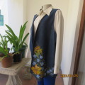 Get noticed in this hand floral painted denim open waistcoat. Reversible. Size 44 to 46. New cond.