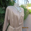Feminine long stretch top in earthy tones. Gathered front neckline. Peephole.By MERIEN HALL size 46