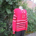 Warm bulky acrylic handknitted red pullover cardigan in red with white/black border stripes. Size 40