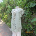Amazing romantic fern green richly embroidered long top with cut-out work. Size 40 from Indonedia.