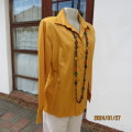 Tailored honey colour long sleeve top. Button down with shirt collar. Size 42 by EXACT. New cond.