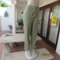Ultra chic and versatile fern green stretch polyester high waisted pants. By YOO LIM size 38.As new