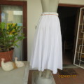 HIGH FASHION white cotton high waisted half flare skirt in 18 panels. Size 34 to 36. As new.