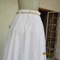 HIGH FASHION white cotton high waisted half flare skirt in 18 panels. Size 34 to 36. As new.