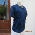 Short sleeve sport top in navy marble pattern size 36 by UNIQLO. Underarm breathing fabric. New cond