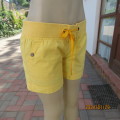 Pair of yellow cotton shorts by CHEROKEE size 34/10. Pockets back/front. Elasticated waist. As new