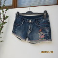 Sexy blue denim distressed jean shorts size 28/4. 85cm hips. 13/14yr old girl. Embroidery. As new