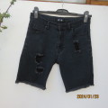 Wash-out black distressed RT shorts size 32. Waist 79 Hips 91cm.Longer leg.Poly/rayon/cotton stretch