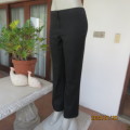 The ultimate in quality!. Perfect fit size 36 poly/viscose with some stretch black pants. WOOLWORTHS