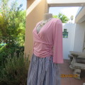 On trend blush pink empire waist cropped cross over top with side drawstrings. Size 36 by TRU.As new