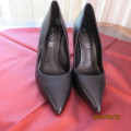 Pair high quality genuine leather black ALDO sleek high heel shoes size 4. Very good cond.