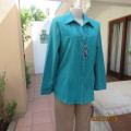 High quality jade long sleeve button down top with V and open collar. Embossed stripes.By ML size 38