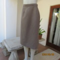 Elegant light brown polycotton boutique made pencil skirt. Size 42/18. Pleat and zip at back.New con