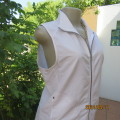 Snow white sleeveless zip up NEWS Sport size 38/14 top. Back yoke/breathing fabric. Kangoroo pockets
