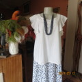 Famous brand white stretch cotton top by JASPER CONRAN from London. Frilled sleeveless size 36/12.
