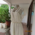 Special occasion rich cream vintage dress by TREASURES size 38. Polyester underlay with lace overlay