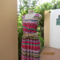 Cheerful horizontal pattern striped ankle length sleeveless dress. Elasticated waist.Size 37/13.