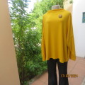 What not to like about this amber yellow warm polyknit top! Dolman sleeves. High cut neckline. 48/50