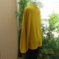 What not to like about this amber yellow warm polyknit top! Dolman sleeves. High cut neckline. 48/50