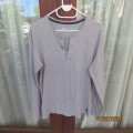 As new Men`s grey long sleeve T-Shirt in 100% cotton.Opening on front with 3 buttons. By AU. 87/94cm