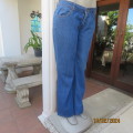 As new blue denim bootlegged jeans size 36/12 by RT. Pockets back/front. In polycotton stretch.
